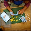 Lifestyle view highlighting the manual building and assembly process of the Retro Telephone model. 