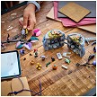 Lifestyle view highlighting the manual building and assembly process of the LEGO® | Disney™ 43288 Sally's Flowerpot model. 