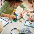 Lifestyle view highlighting the manual building and assembly process of the LEGO® | Disney™ 43290 Kevin & Dug model. 
