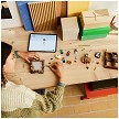 Lifestyle view highlighting the manual building and assembly process of the LEGO® Minecraft® 21272 Woodland Mansion Fighting Ring model. 