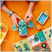 Lifestyle view highlighting the manual building and assembly process of the LEGO® DOTS 41937 Multi Pack - Summer Vibes (SOLD OUT) model. 