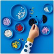 Lifestyle view highlighting the manual building and assembly process of the LEGO® DOTS 41938 Creative Designer Box (SOLD OUT) model. 