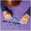 Lifestyle view highlighting the manual building and assembly process of the LEGO® DOTS 41942 Into the Deep Bracelets with Charms (SOLD OUT) model. 