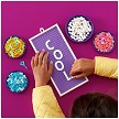 Lifestyle view highlighting the manual building and assembly process of the LEGO® DOTS 41951 Message Board (SOLD OUT) model. 